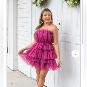 Short purple tulle dress.